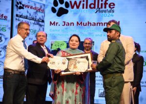 Coordinator to PM on Climate Change, Romina Khurshid Alam gives away a certificate of recognition to a wildlife official in recognition of wildlife protection at the Pakistan Wildlife Protection Award ceremony 2024 at Pakistan National Council of Arts.