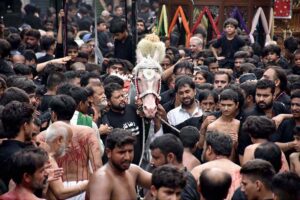 A large number of mourners attending the procession of 9th Muharram-ul-Haram. Muharramul Harram known as the first month of the Islamic calendar and the mourning month in remembrance of the martyrdom (Shahadat) of Hazrat Imam Hussain (RA), the grandson of the Holy Prophet Mohammad (PBUH).