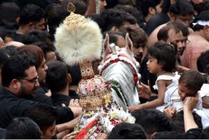 A large number of mourners attending the procession of 9th Muharram-ul-Haram. Muharramul Harram known as the first month of the Islamic calendar and the mourning month in remembrance of the martyrdom (Shahadat) of Hazrat Imam Hussain (RA), the grandson of the Holy Prophet Mohammad (PBUH)