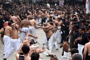 Mourners oozing themselves with knives and chains during the procession of 9th Muharram-ul-Haram. Muharramul Harram known as the first month of the Islamic calendar and the mourning month in remembrance of the martyrdom (Shahadat) of Hazrat Imam Hussain (RA), the grandson of the Holy Prophet Mohammad (PBHU).