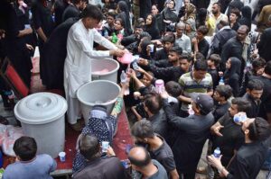 Mourners oozing themselves with knives and chains during the procession of 9th Muharram-ul-Haram. Muharramul Harram known as the first month of the Islamic calendar and the mourning month in remembrance of the martyrdom (Shahadat) of Hazrat Imam Hussain (RA), the grandson of the Holy Prophet Mohammad (PBHU).