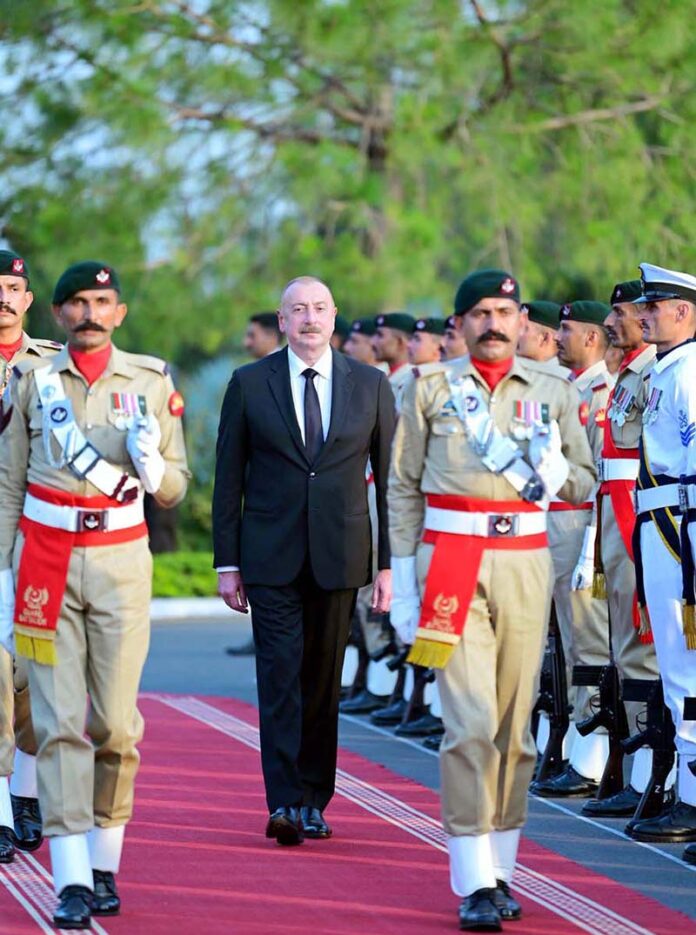 President of Azerbaijan H.E. Ilham Aliyev inspects the guard of honor being presented to him at the Prime Minister House