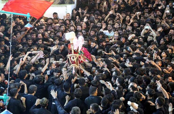 A large number of mourners attending the procession of 9th Muharram-ul ...