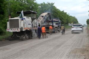Labourers busy repairing Bari Imam Road during repairing and development work in Federal Capital