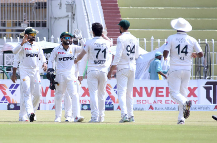 Pakistan players celebrating the wicket of batter Zakir Hasan during the 3rd day of 1st Test cricket match playing between Pakistan and Bangladesh at Pindi Cricket Stadium