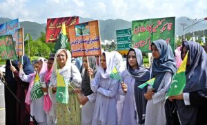 Students holding demonstration against India’s illegal and unilateral actions of 5 August 2019 in Indian Illegally Occupied Jammu and Kashmir (IIOJK) to mark Youm-e-Istehsal Kashmir (Exploitation Day) at D-Chowk.