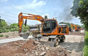 Heavy machinery is being used for the construction of bridge at the site of under construction 10th Avenue during development work in Federal Capital.