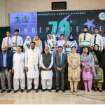 Executive Director General of Information Service Academy (ISA) Muhammad Arshad Munir poses for a group photo during an event organized to mark the 78th Independence Day celebrations