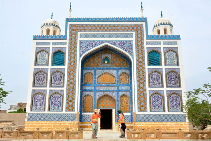 Workers diligently clean the Tomb of Mian Ghulam Shah Kalhoro, the Founder of Hyderabad, at Kalhoro Colony