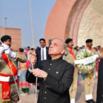 Prime Minister Muhammad Shehbaz Sharif hoists the national flag at the Pakistan Monument on the 78th Independence Day