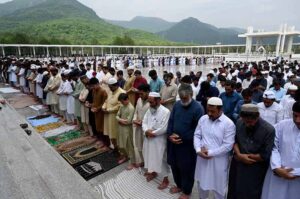 Imam Masjid Al-Nabawi (SAW) Dr. Salah bin Mohammad Al-Budair leads the Friday prayer at Faisal Masjid, attended by a large number of people