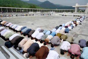 Imam Masjid Al-Nabawi (SAW) Dr. Salah bin Mohammad Al-Budair leads the Friday prayer at Faisal Masjid, attended by a large number of people