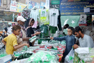Family is busy selecting and purchasing the national flag and other items in connection with upcoming Independence Day celebrations.