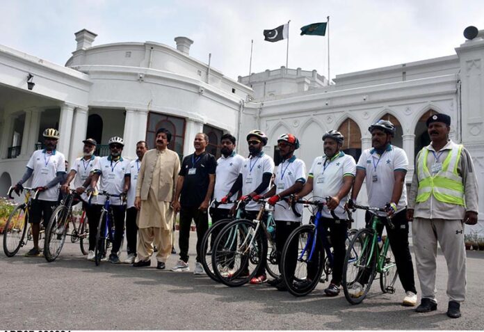 Governor Punjab Sardar Salim Haider Khan sending off the participants of the Sports Cycle Rally on the occasion of the Independence Day of Pakistan President Asif Ali Zardari