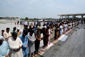 Imam Masjid Al-Nabawi (SAW) Dr. Salah bin Mohammad Al-Budair leads the Friday prayer at Faisal Masjid, attended by a large number of people