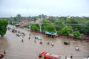 A view of rain water at Committee Chowk Jhang Road blocked due to heavy downpour