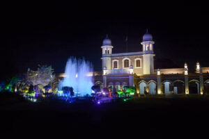 The District Council building illuminated with colorful lights in celebration of Independence