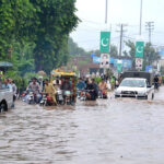 A view of rain water at Committee Chowk Jhang Road blocked due to heavy downpour