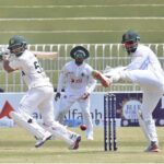Pakistani batsman Mohammad Rizwan thanked God after scoring century (100 runs) during the 2nd day of 1st Test cricket match between Pakistan and Bangladesh teams at the Rawalpindi Cricket Stadium