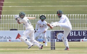 Pakistani batsman Mohammad Rizwan thanked God after scoring century (100 runs) during the 2nd day of 1st Test cricket match between Pakistan and Bangladesh teams at the Rawalpindi Cricket Stadium