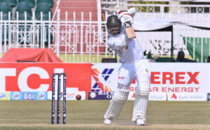 Bangladesh batsman Mehidy Hasan Miraz celebrates after scoring a half-century (50 runs) during the fourth day of the 1st Test Cricket Match playing between Pakistan and Bangladesh at Pindi Cricket Stadium.