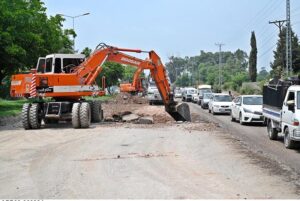 Heavy machinery is being used for the construction of bridge at the site of under construction 10th Avenue during development work in Federal Capital.