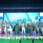 Prime Minister Muhammad Shehbaz Sharif with the singers and students who performed at the Independence Day event