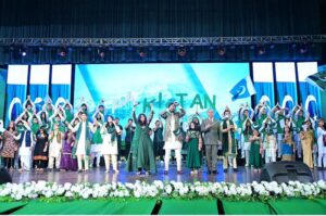 Prime Minister Muhammad Shehbaz Sharif with the singers and students who performed at the Independence Day event