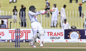 Bangladesh batsman Mehidy Hasan Miraz celebrates after scoring a half-century (50 runs) during the fourth day of the 1st Test Cricket Match playing between Pakistan and Bangladesh at Pindi Cricket Stadium.