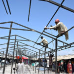 Rehabilitation work begins at Peshawar Mor Weekly Bazaar after extensive fire damaged and burned numerous stalls