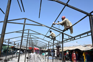 Rehabilitation work begins at Peshawar Mor Weekly Bazaar after extensive fire damaged and burned numerous stalls