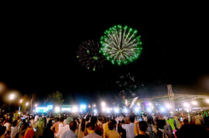 A large number of people attending firework celebration on the eve of Independence Day of Pakistan at F-9 Park