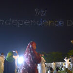 A large number of people witnessing the first Drone Light Show organized by Govt of Pakistan in the federal capital to commemorate the Independence Day at F-9 Park