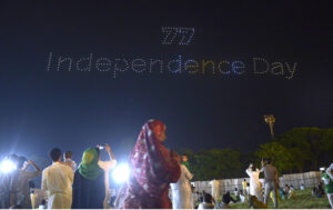 A large number of people witnessing the first Drone Light Show organized by Govt of Pakistan in the federal capital to commemorate the Independence Day at F-9 Park