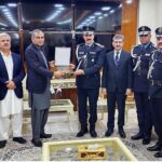 Federal Minister for Interior Mohsin Naqvi presenting souvenir to Commander of Iraq's Rapid Response Unit Lieutenant General Dr Tahmeir Ismail