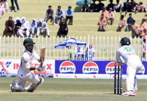 Pakistan batter Saim Ayub escapes of a bouncing ball during the second day of the last cricket Test match playing between Pakistan and Bangladesh at Pindi Cricket Stadium