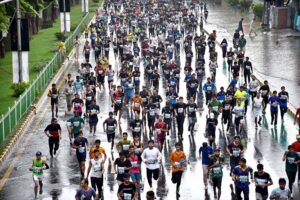 A large number of participants take part in the Azadi Marathon 2024, a 12KM race celebrating Pakistan's 77th Independence Day, organized by the Youth Affairs & Sports Department.