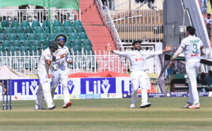 Bangladesh players celebrating the wicket of Pakistan’s Saud Shakeel during the second day of last cricket Test match between Pakistan and Bangladesh at Pindi Cricket Stadium