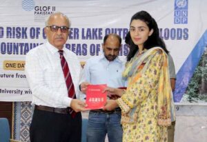 Vice Chancellor Karakoram International University Attaullah Shah is distributing award letter to selected students for pursuing higher education in Chinese Universities for two years.