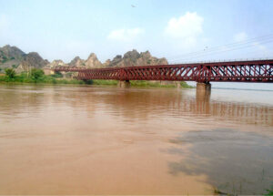 A striking view of the Chenab River’s water level rising due to persistent rains.
