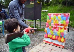GALIYAT: Aug 19 - Tourist children enjoy a swing at Nathia Gali Park, adding a touch of joy to the scenic beauty.
