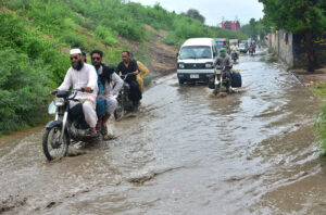 A view of rain water accumulated at Eid Gah after heavy rain in the city.