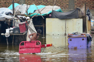 A flooded road in Latifabad Unit 02 after heavy rainfall leaves streets submerged