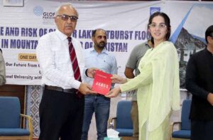 Vice Chancellor Karakoram International University Attaullah Shah is distributing award letter to selected students for pursuing higher education in Chinese Universities for two years.
