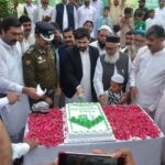 Cake cutting after Hoisted Pakistan flag ceremony with higher officials and public of district at a ceremony to mark the 78th Independence Day of Pakistan held in the city
