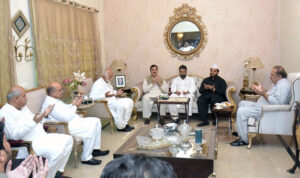 Chairman Senate Syed Yusuf Raza Gilani offering fateha on the death of Makhdoom Syed Hamad Raza with his brothers and other relatives.