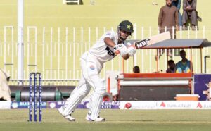 Pakistani batsman Saim Ayub plays shot during the first day of the 1st Test cricket match between Pakistan and Bangladesh teams at the Rawalpindi Cricket Stadium.