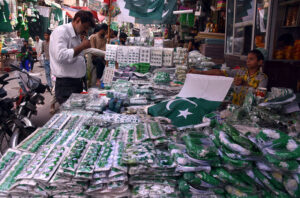 Student create a vibrant national flag at Alhamra Arts Council's summer camp for Independence Day.