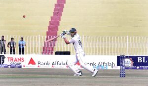 Pakistani batsman Saim Ayub plays shot during the first day of the 1st Test cricket match between Pakistan and Bangladesh teams at the Rawalpindi Cricket Stadium.