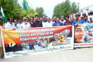 Deputy Commissioner Zain-ul- Abideen Memon another officials participants in a rally organized by the District Administration, protesting against India's illegal actions in Indian Illegally Occupied Jammu and Kashmir (IIOJK) to mark Youm-e-Istehsal Kashmir (Exploitation Day), express solidarity with Kashmiri people at Thandi Sarak.